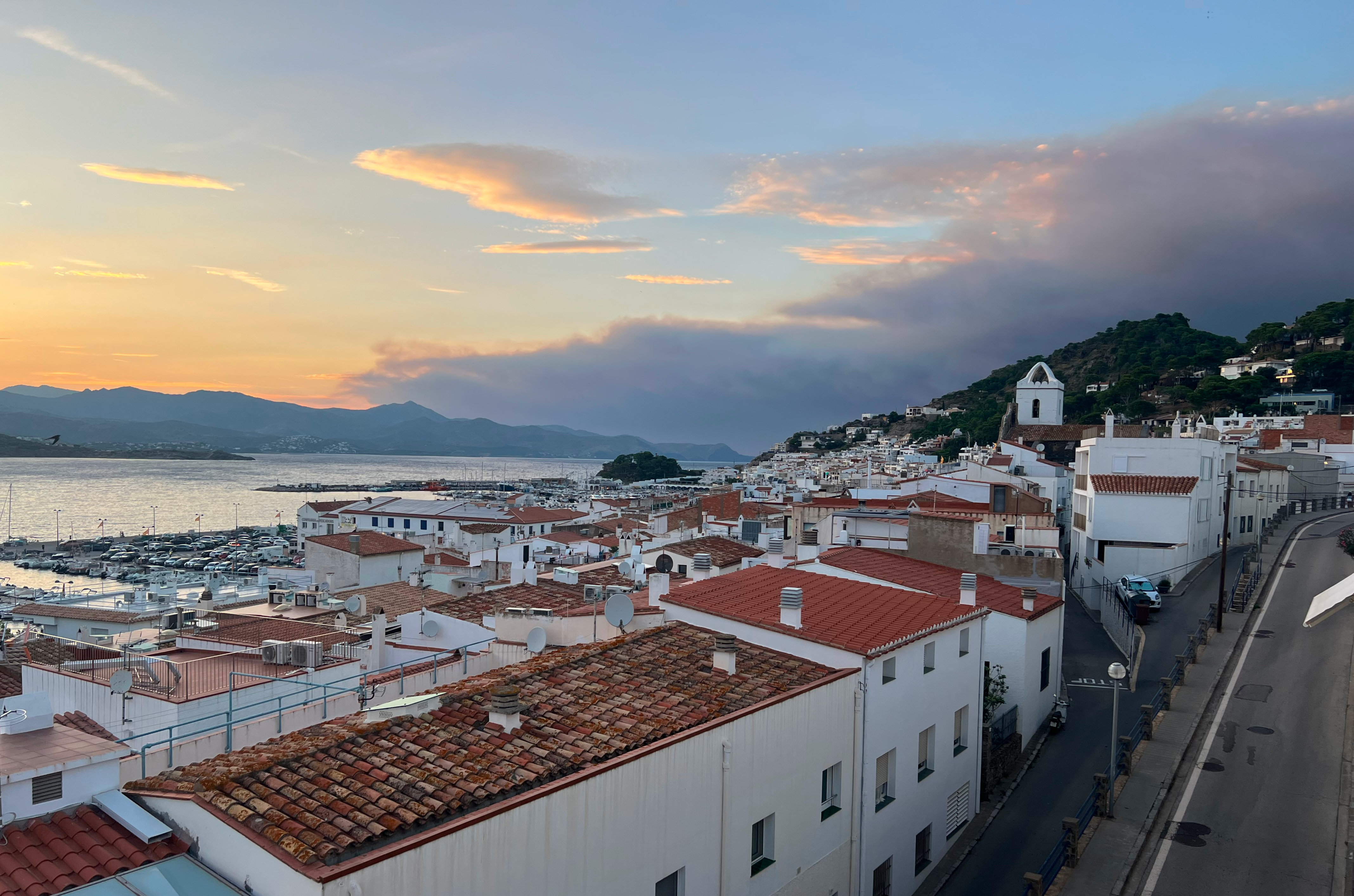 Smoke from the Ribauta fire visible from Port de la Selva in Catalonia