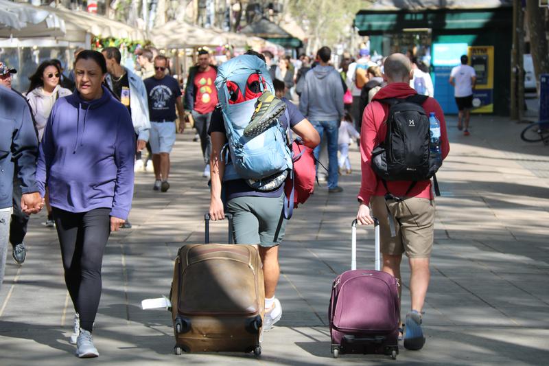 Tourists on Barcelona's La Rambla boulevard over Easter 