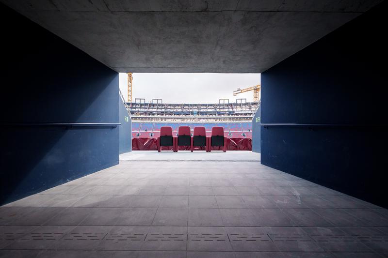 Detail of the VIP stands of FC Barcelona's Spotify Camp Nou with several cranes in the background