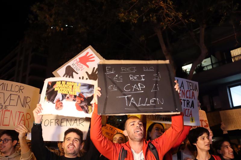 Protesters outside the People's Party offices in Barcelona denounce the flood emergency response and crisis management of regional president Carlos Mazón