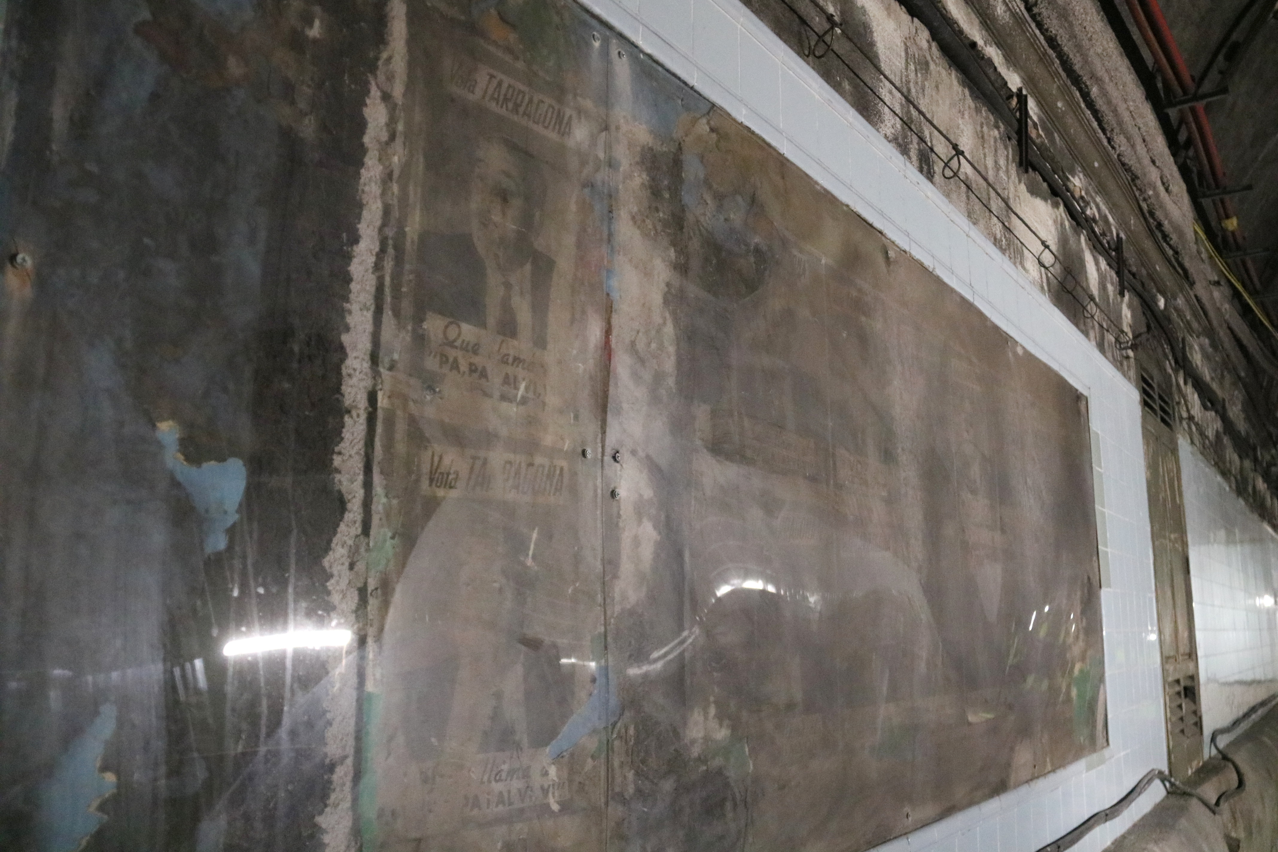 Electoral posters of candidate Eduardo Tarragona for a regional 1971 election hanging at Barcelona’s Correus ghost metro station