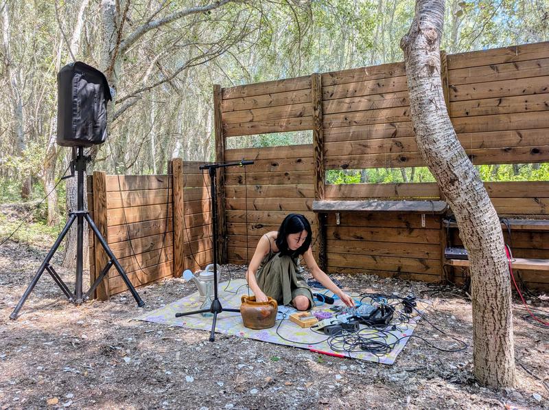 Artist Lina Choi performs a section of her ambient composition 'Amniotic River' at the presentation of Eufònic 2025