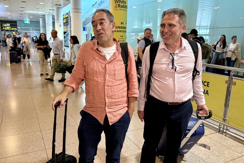 Roberto Barros, one of the travelers who were trapped in Libya, arrive at Barcelona airport on May 16, 2025
