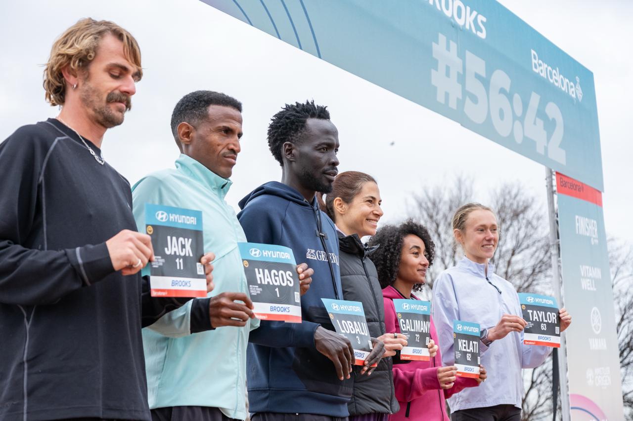 Runners Jack Rayner, Hagos Gebrhiwet, Dominic Lobalu, Marta Galimany, Weini Kelati, and Taylor Roe at the first marathon event
