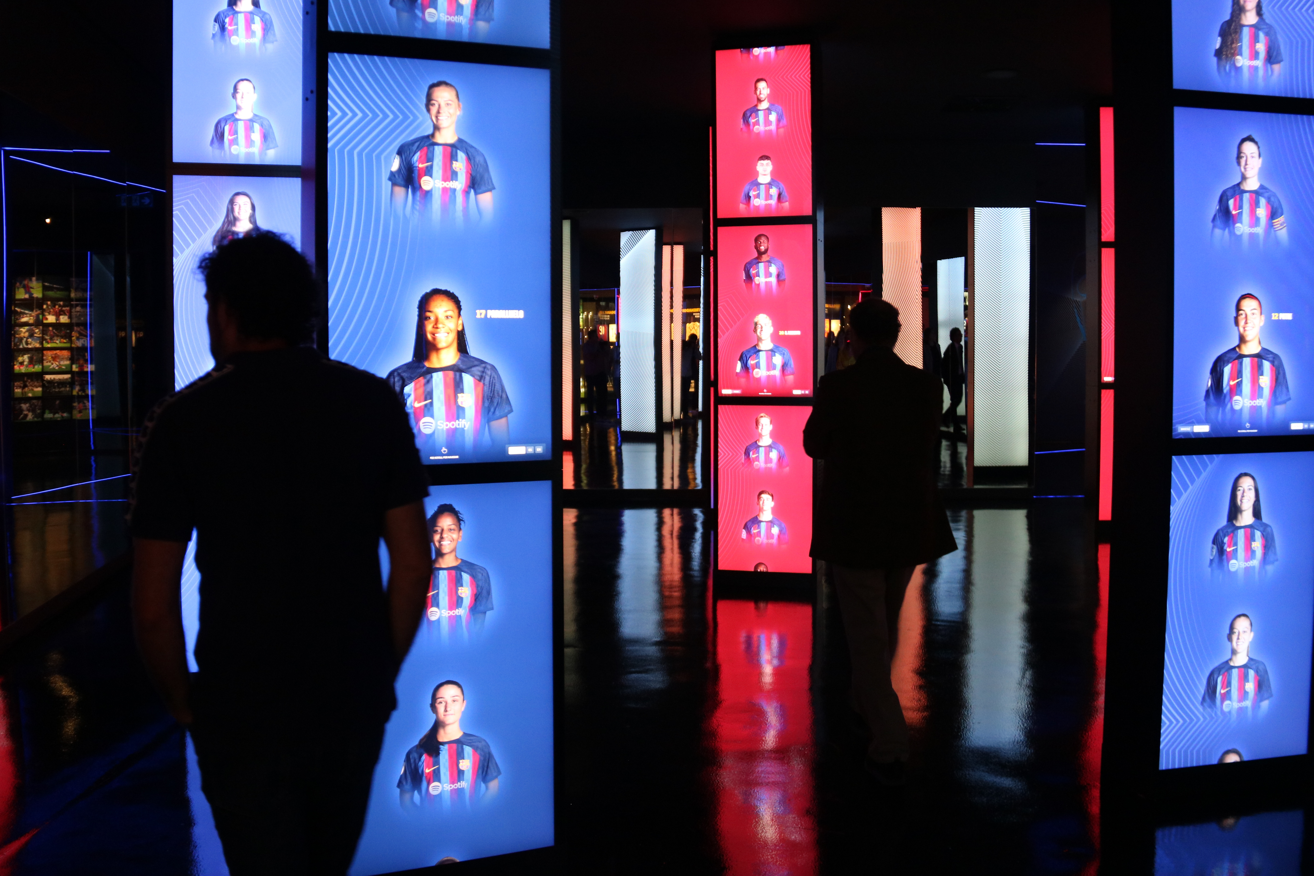 An interactive room at the new FC Barcelona museum on June 6, 2023 with several visitors and members of the first teams