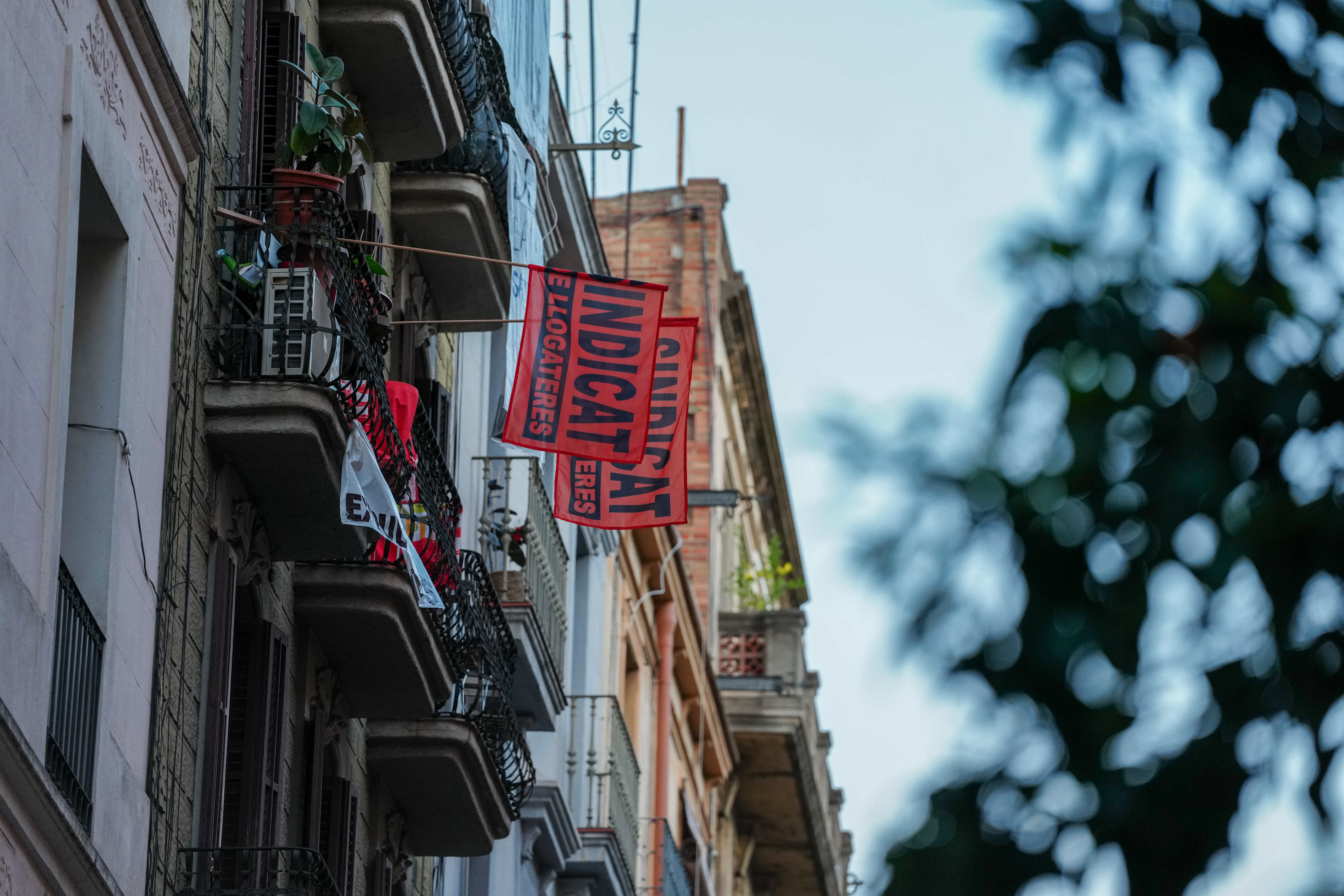 Protest posters hung on Sant Agustí Street in Gràcia.