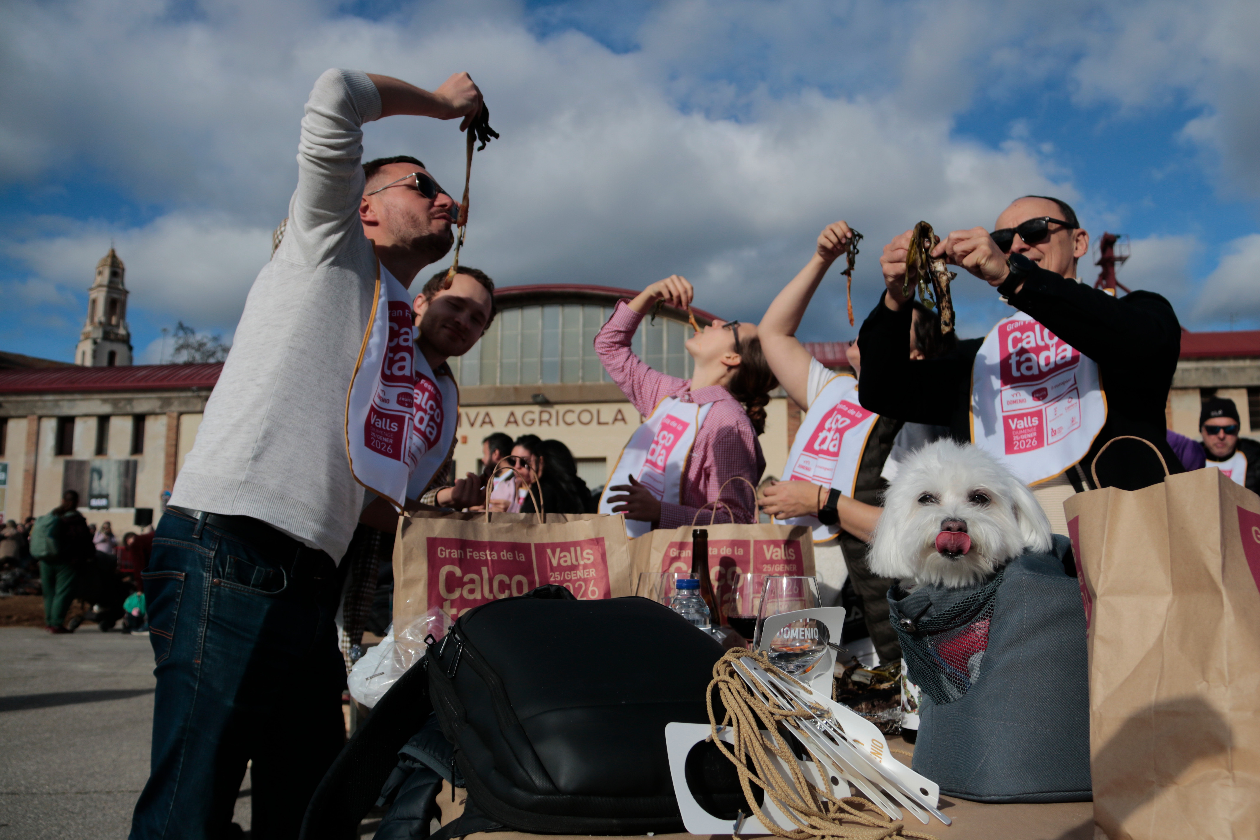 People enjoying calçots