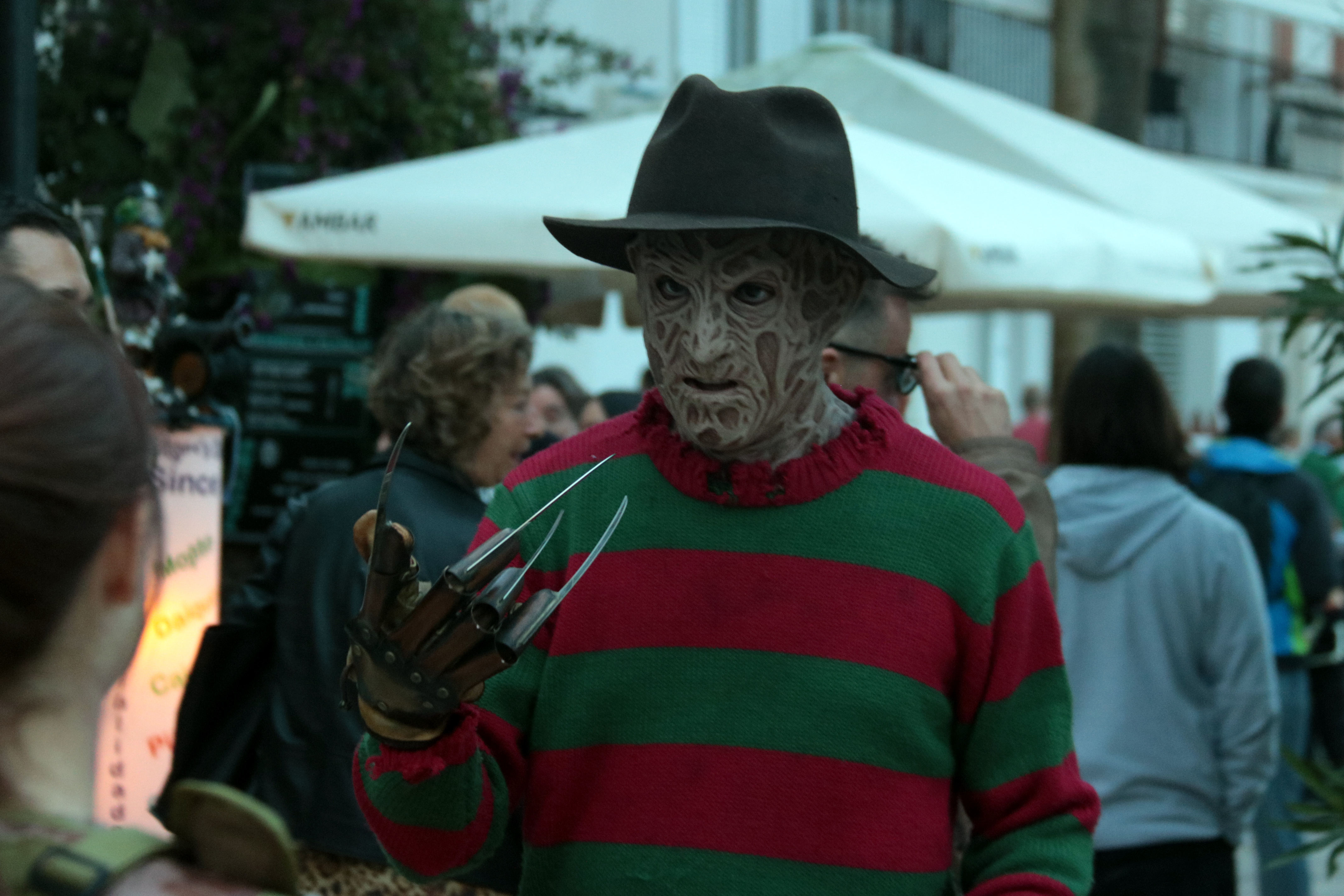 A man dressed as Freddy Krueger just before the parade starts