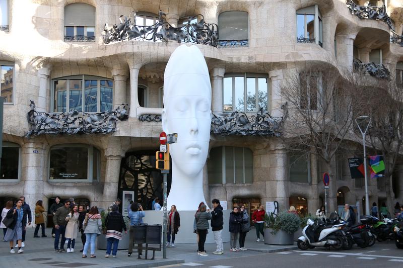 Sculptor Jaume Plensa's piece 'Flora' made in 2021 exhibited outside architect Antoni Gaudí's 'La Pedrera' in Barcelona