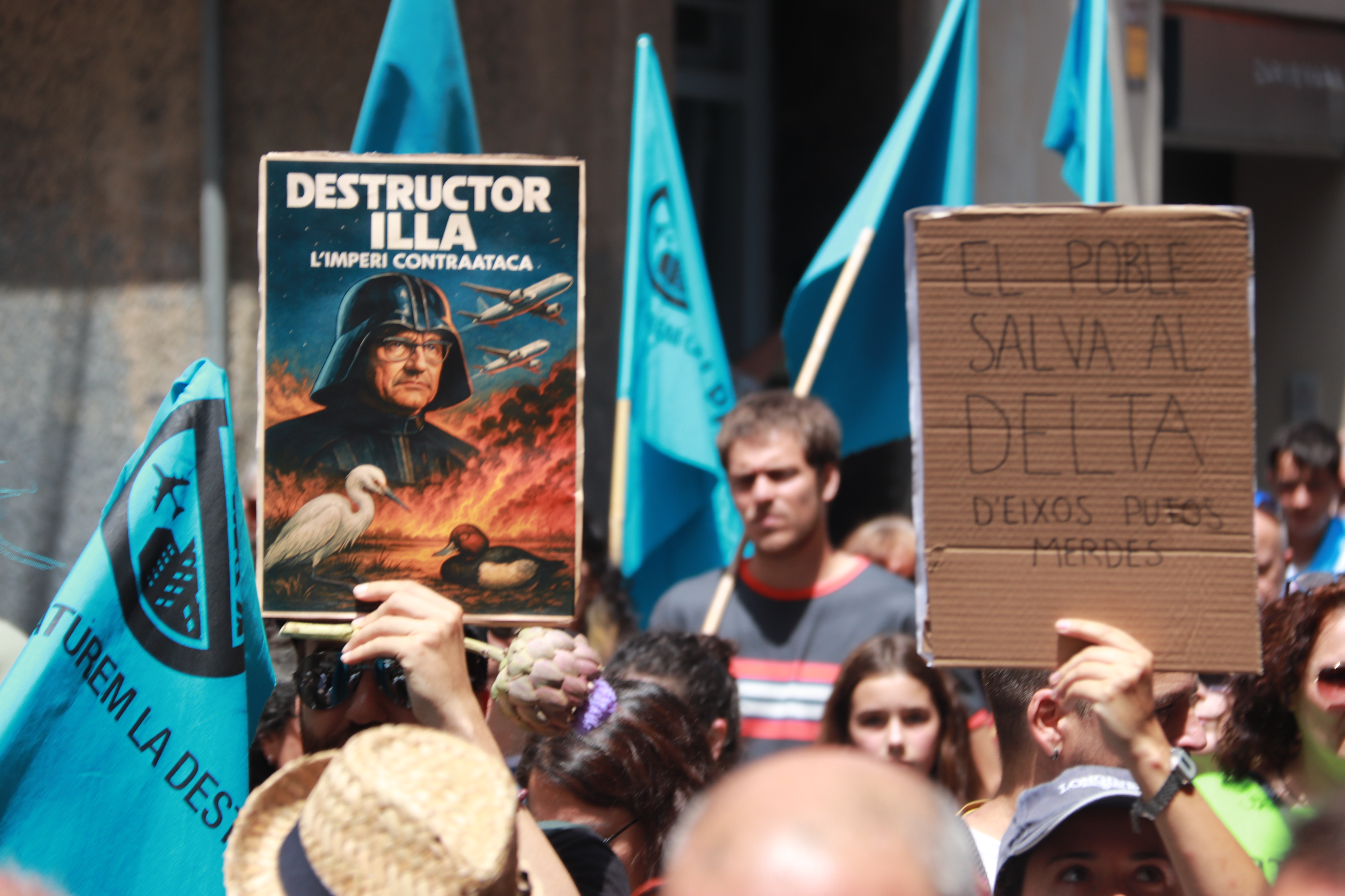 Placards against the expansion of the airport during the march