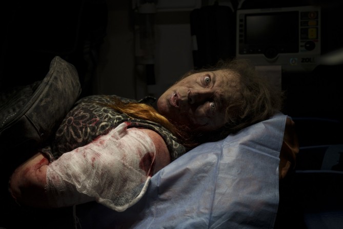 A resident wounded after a Russian attack lies inside an ambulance before being taken to a hospital in Kherson, southern Ukraine, Thursday, Nov 24, 2022