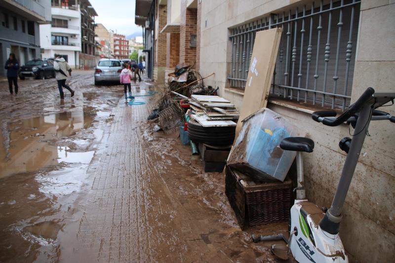 The Mendez Núñez Street in La Ràpita with mud after severe storm on October 13, 2025