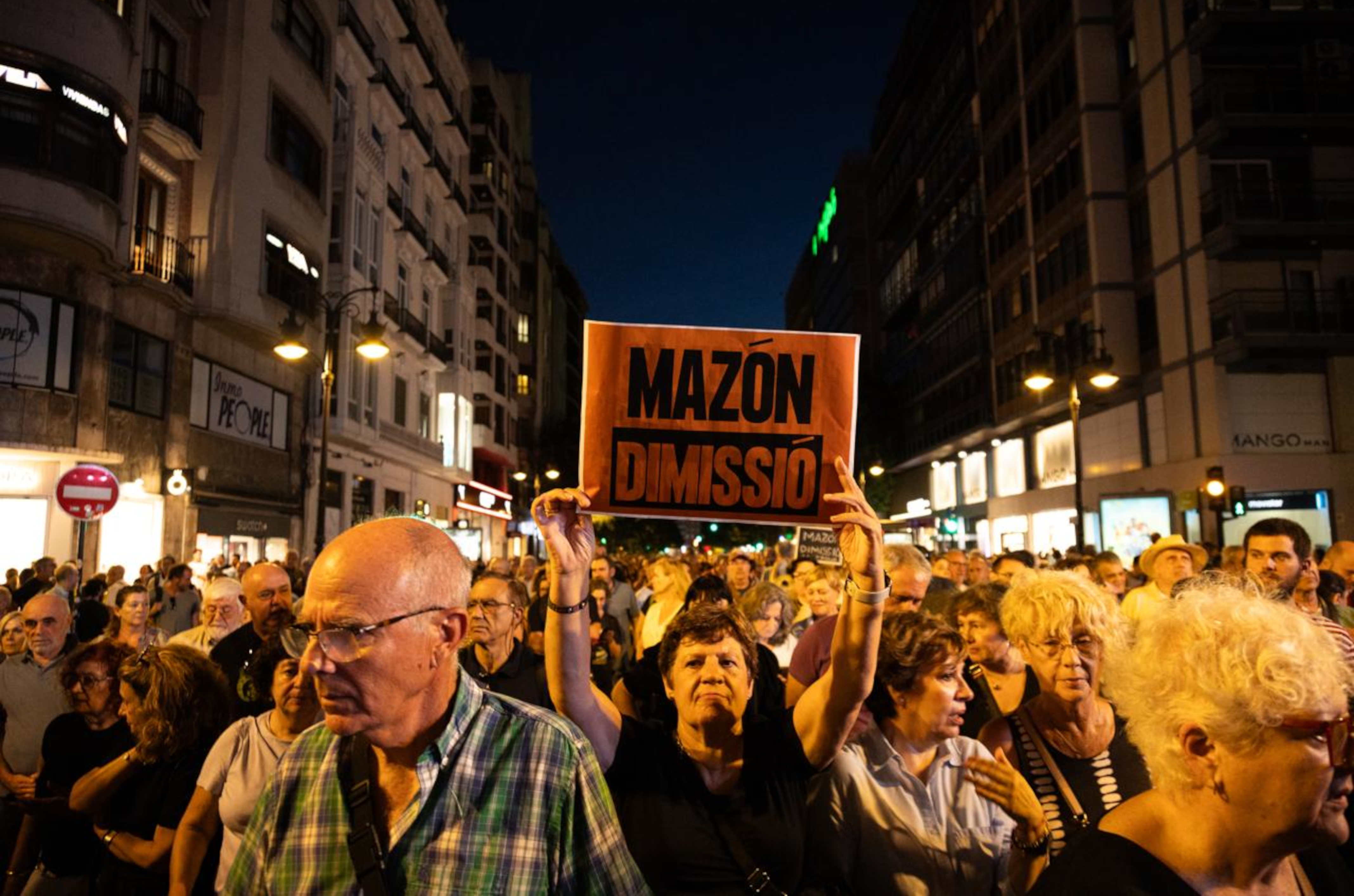 Protesters in Valencia call for the regional president, Carlos Mazón, to resign