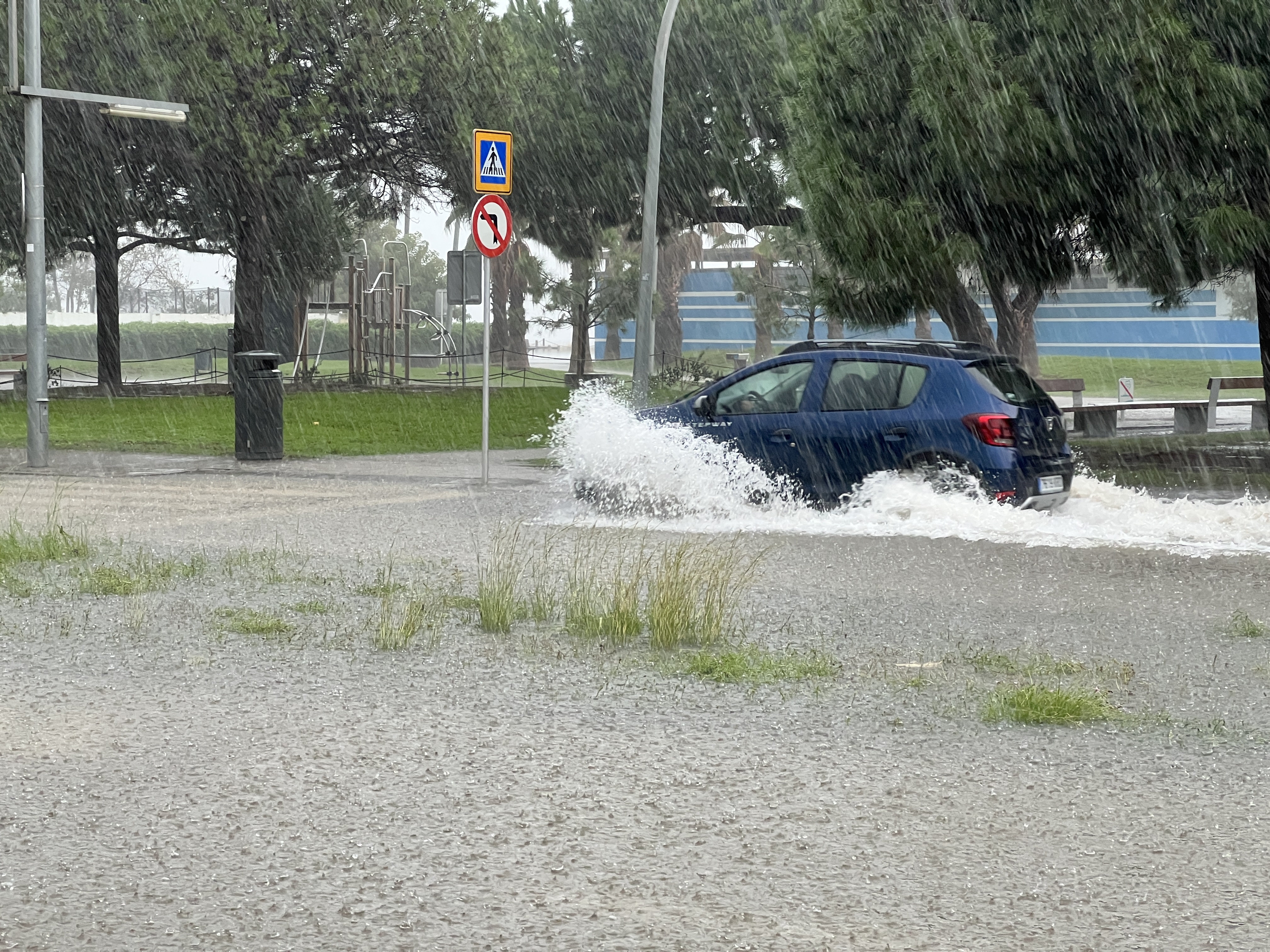 A car in a flooded street in Castelldefels.