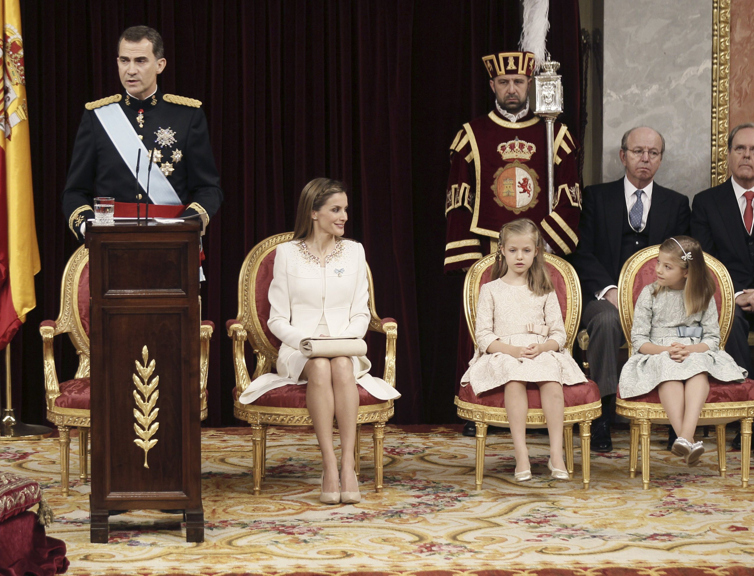 King Felipe VI, during his first speech as king, alongside Queen Letizia, the Princess of Asturias, and Infanta Sofia