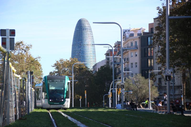 A tramway with the Glòries tower in the background on October 21, 2024