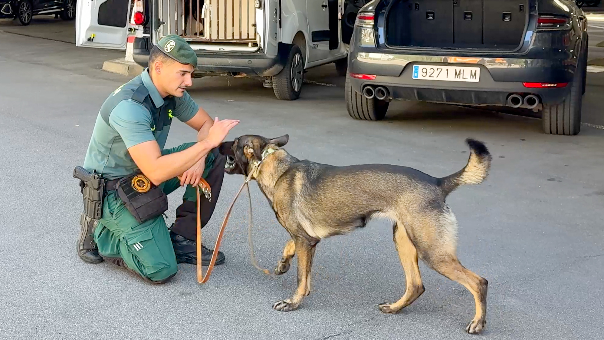 Civil Guard officer Miguel Alaya with working dog Amy