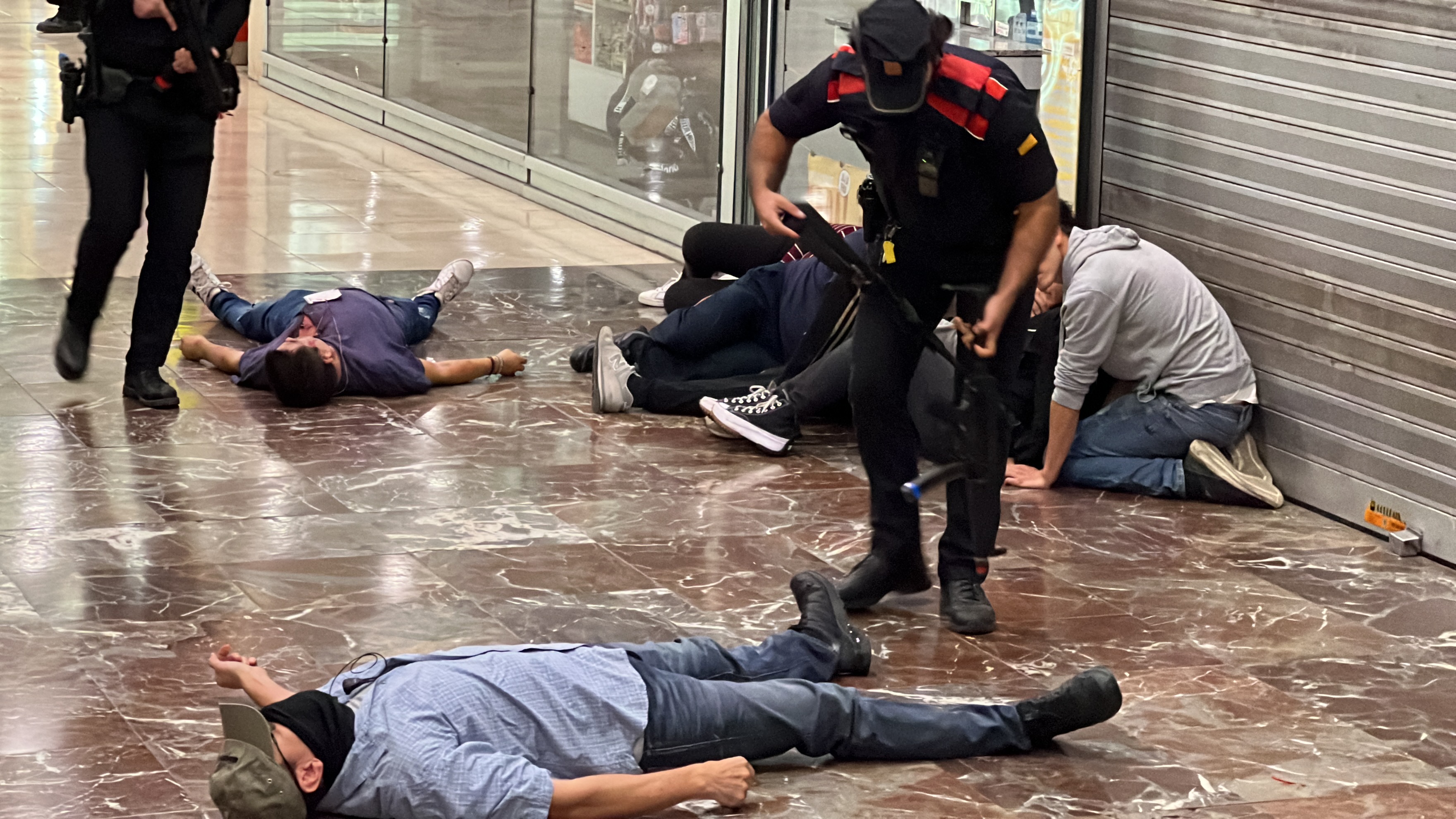 A person playing a dead terrorist during an anti-terrorist operation drills at Barcelona Sants train station on October 27, 2023