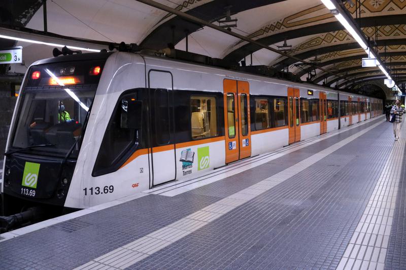 An FGC train at Plaça Catalunya station in Barcelona, December 2021