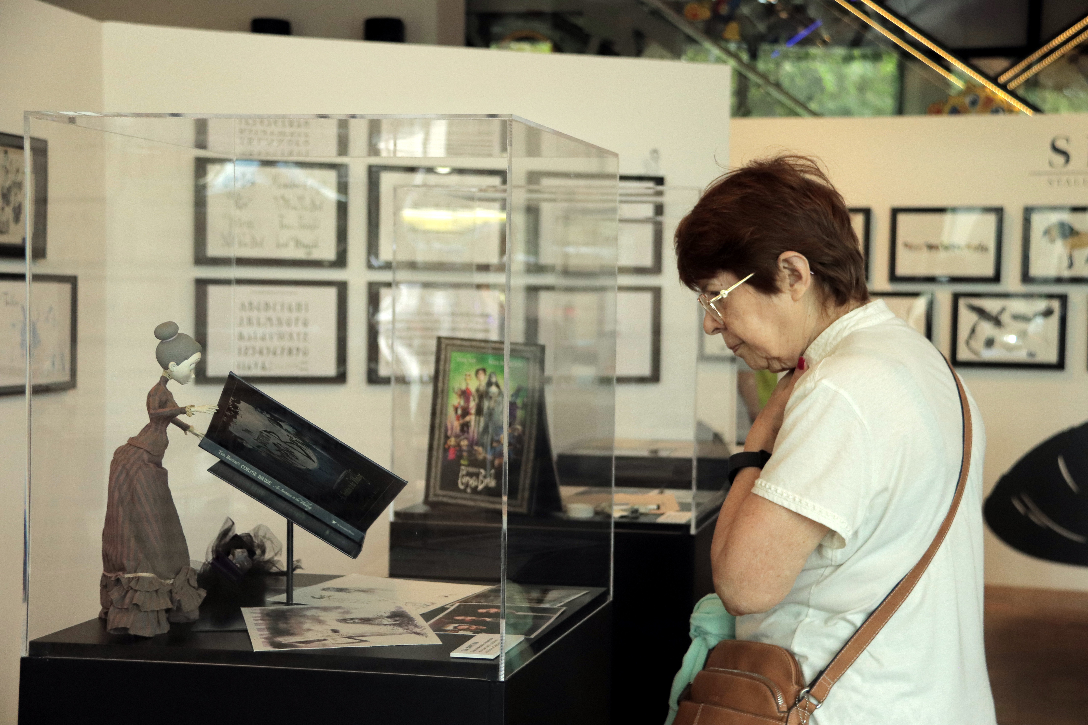 One of the attendees at the exhibition on Barcelona's animation studio, Grangel Studio, at Casa Seat