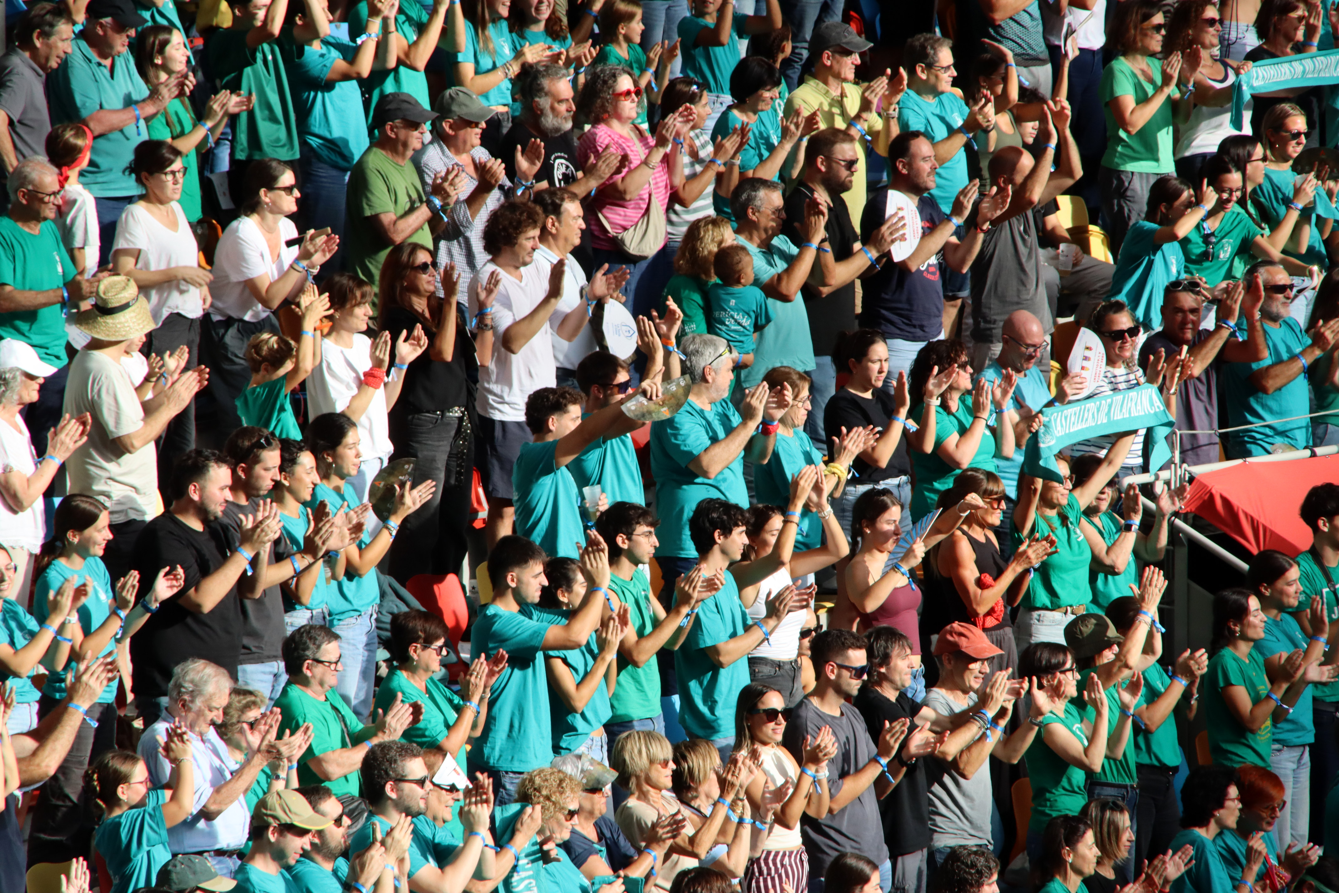 Supporters of the Castellers de Vilafranca celebrating the 3 de 10 amb folre from the first round of Sunday's session at the 30th Tarragona Human Tower Competition.