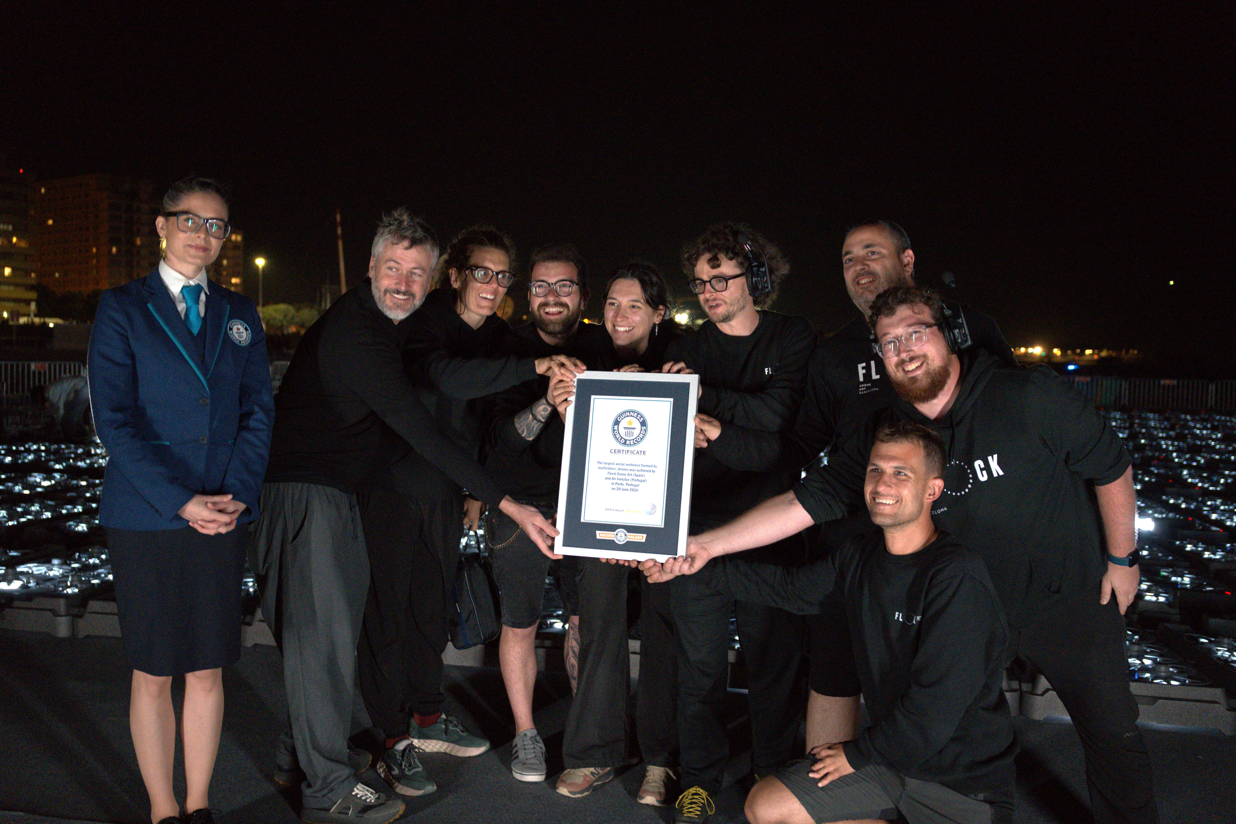 The Flock Drone Art team with the Guinness World Record certificate