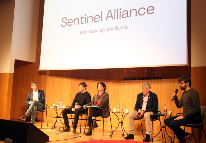 Members of Sentinel Alliance, a victims' group of spyware hacking, speaking on stage