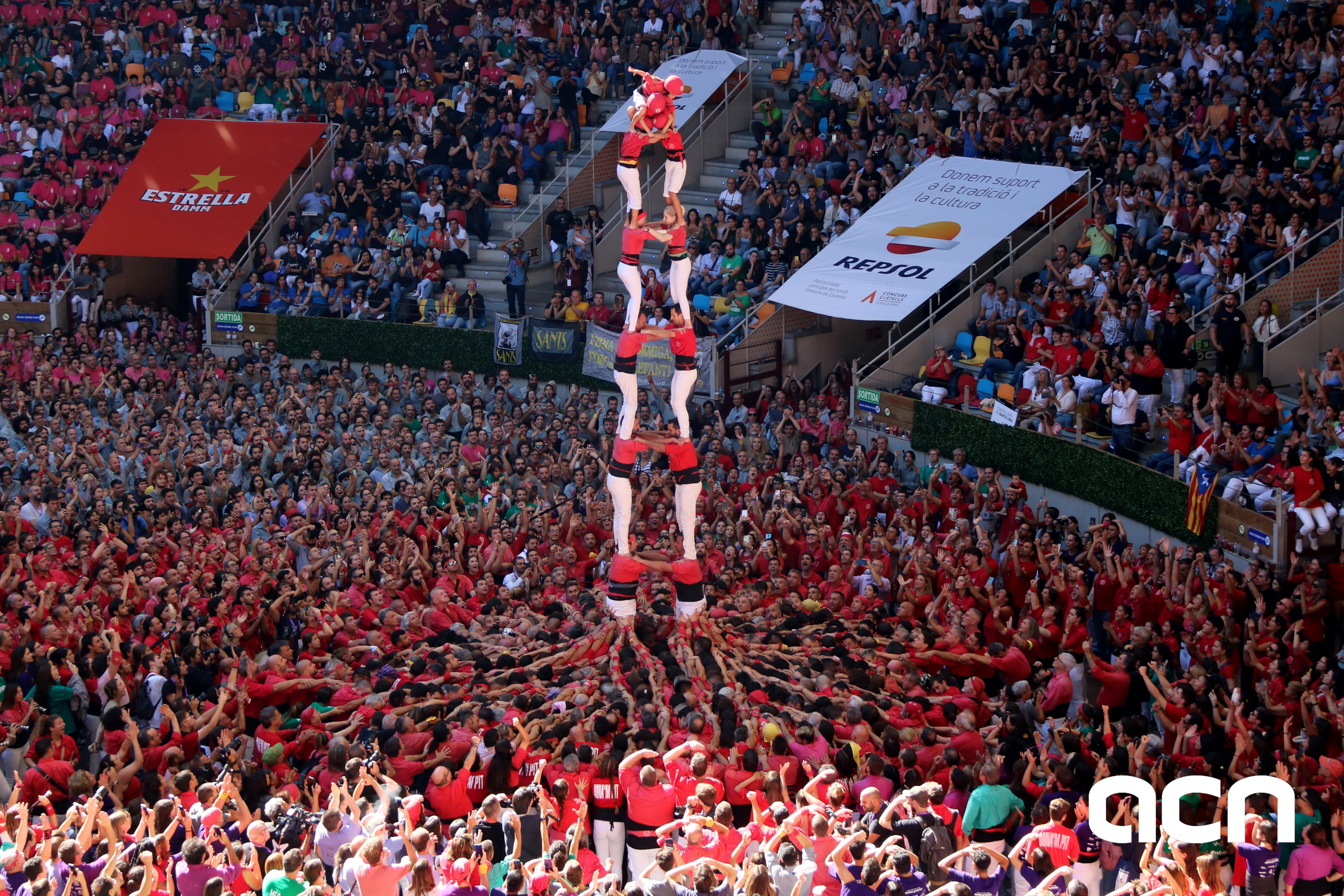 Eight-storey human tower with two people per tier by Colla Joves Xiquets de Valls