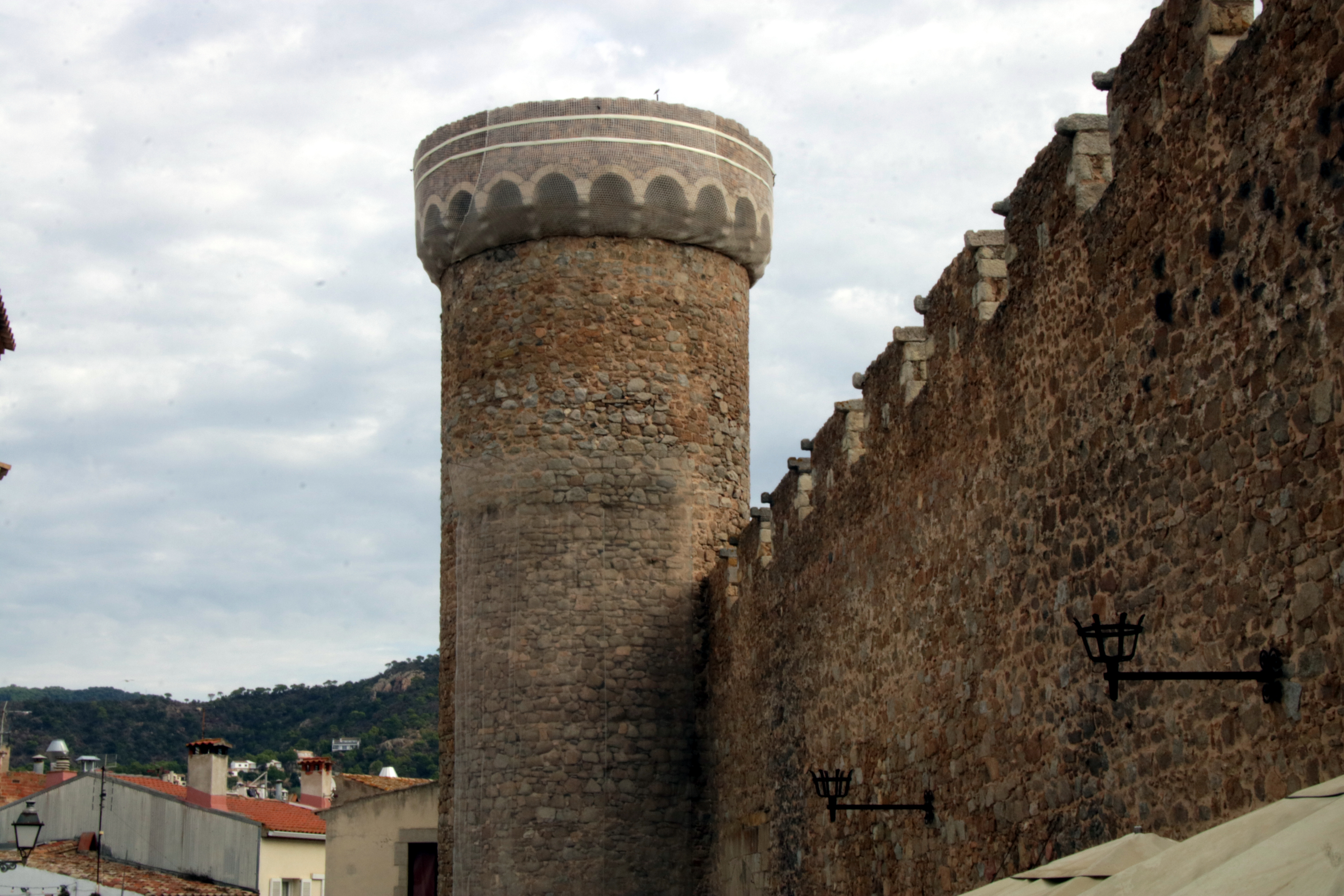 The top of one of the Tossa towers with a protective mesh.