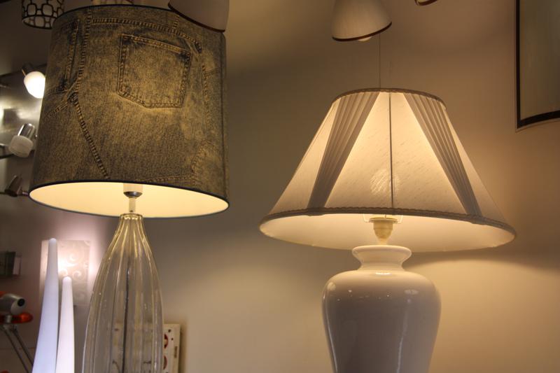 Two lamps lighted up in an electricity store in Barcelona