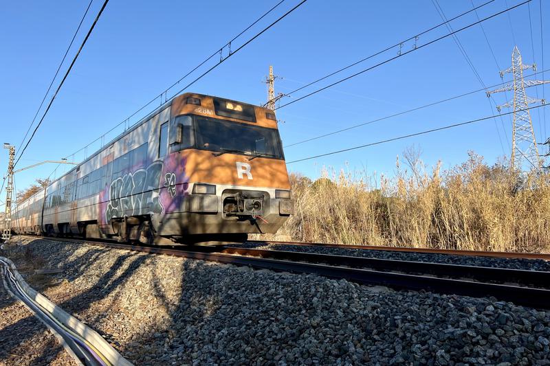 A Renfe Rodalies train on the R4 line between Terrassa and Sabadell
