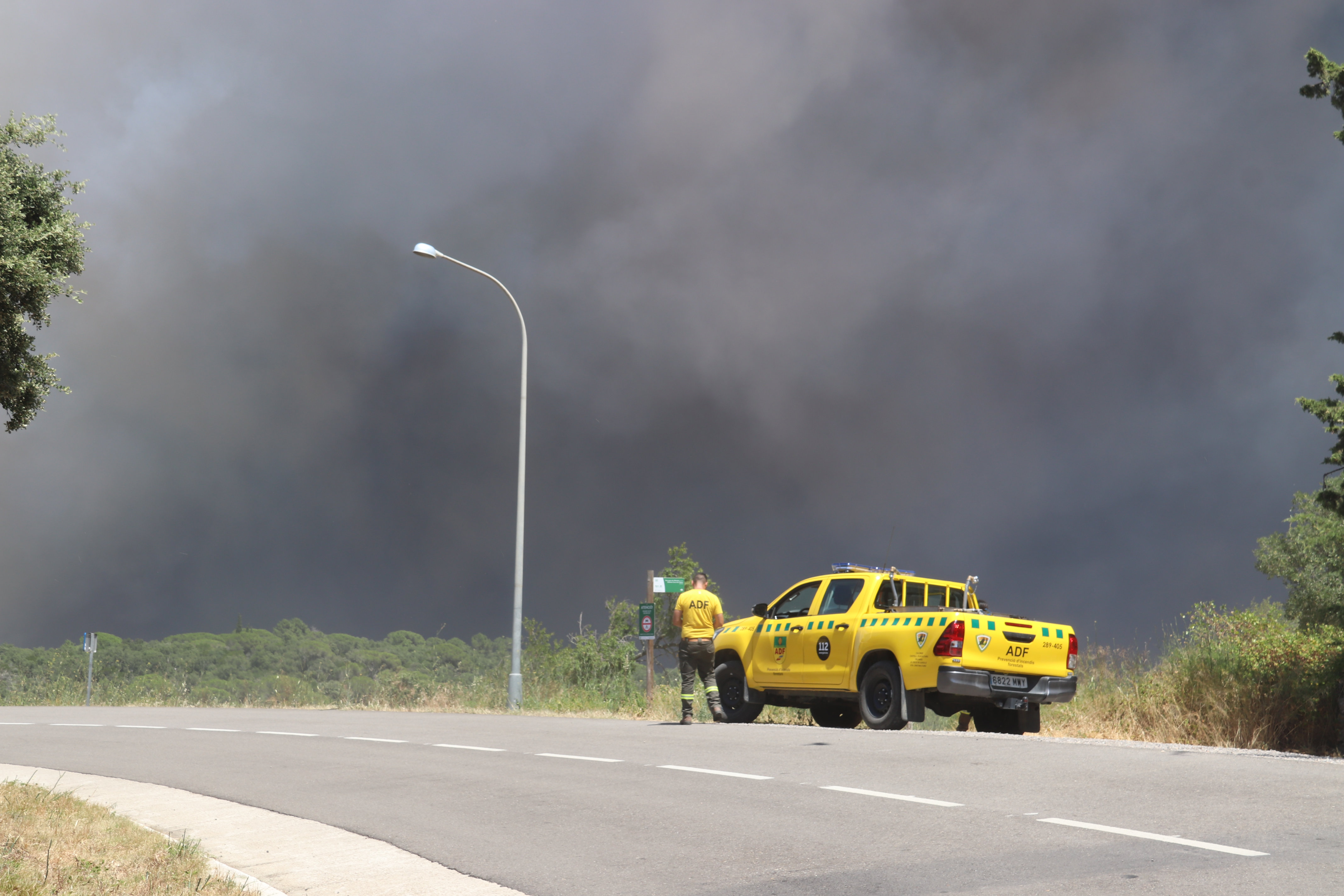 An ADF vehicle monitors the progress of the Gavarres wildfire from Romanyà de la Selva