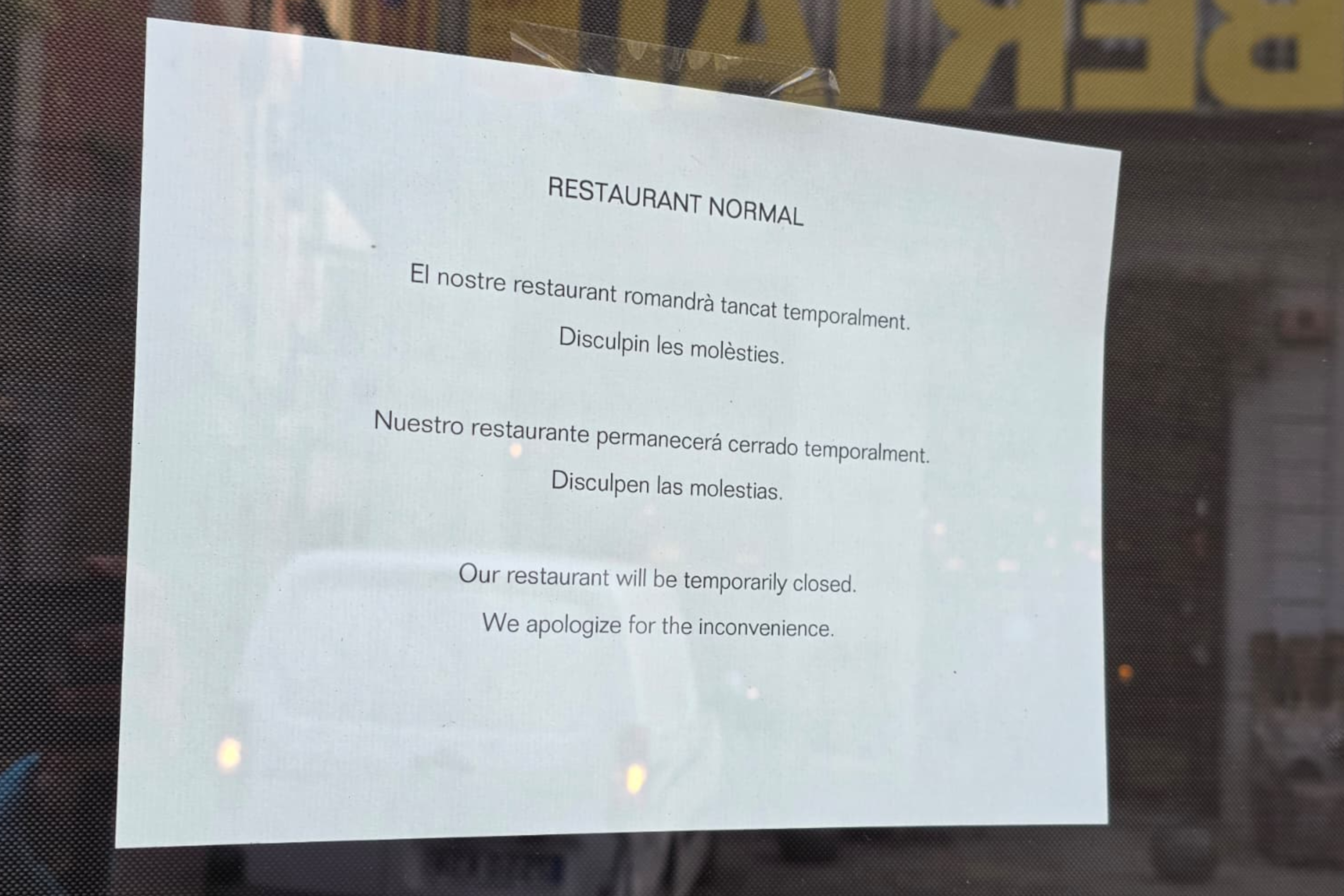 Sign at the Roca brothers' restaurant Normal announcing temporary closure