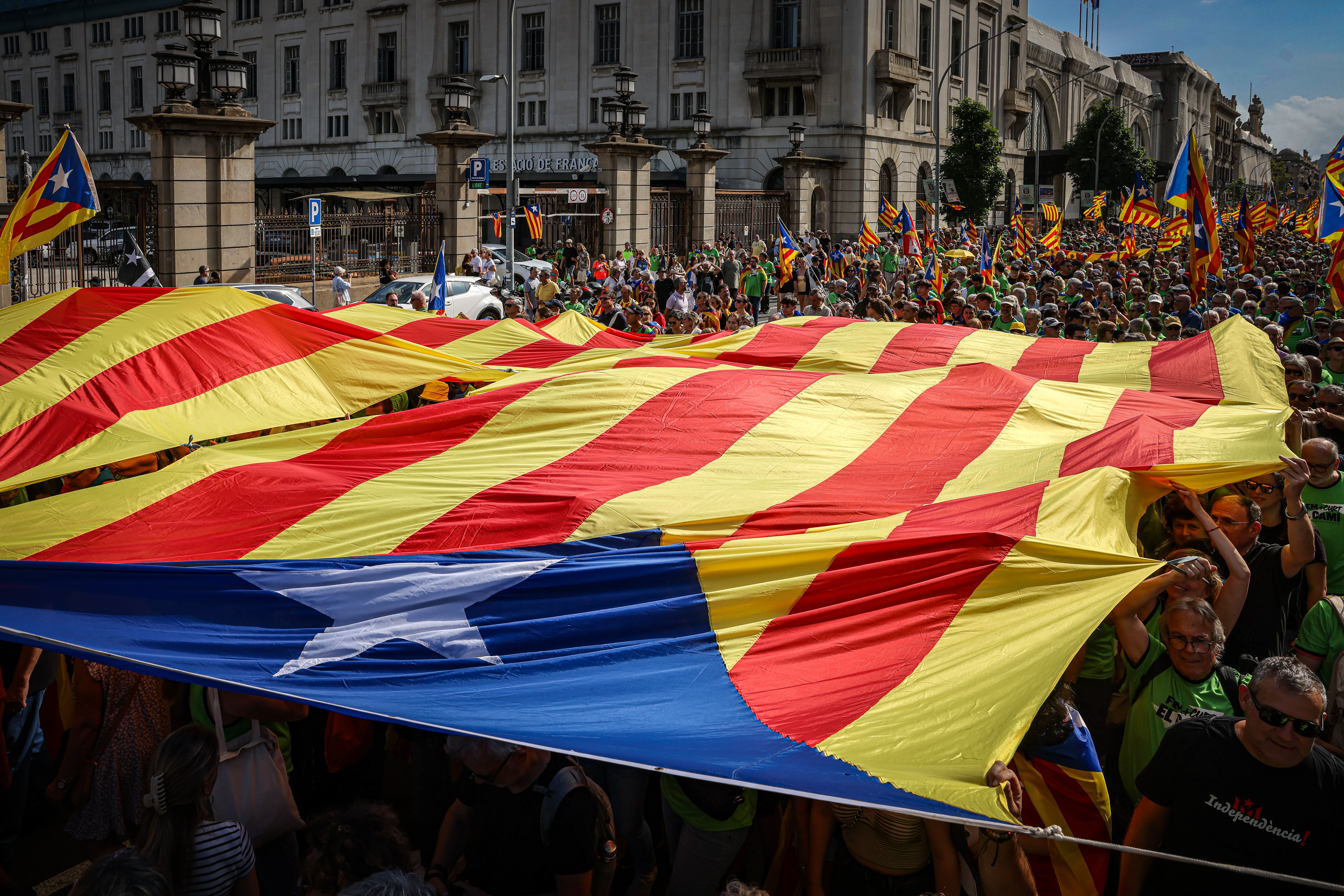 A big estelada flag in the pro-independence protest in Barcelona for Catalonia's National Day, 2024