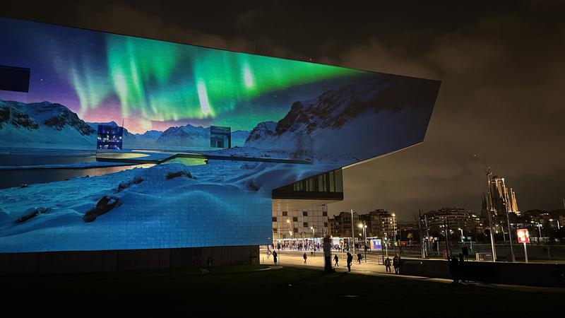 A film projection on the side of the Design Hub in Poblenou, Barcelona, as part of the 2025 Llum Festival