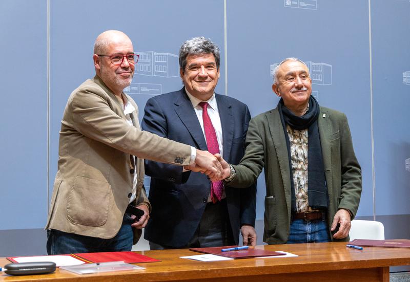 Spain's social security minister, José Luis Escrivá, and CCOO and UGT secretary generals Unai Sordo and Pepe Álvarez