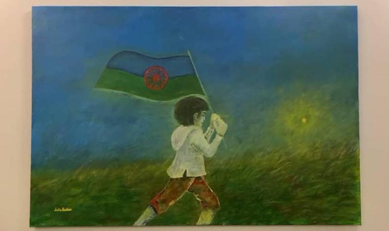 Painting of Roma boy with Roma flag by painter Luis Rodas