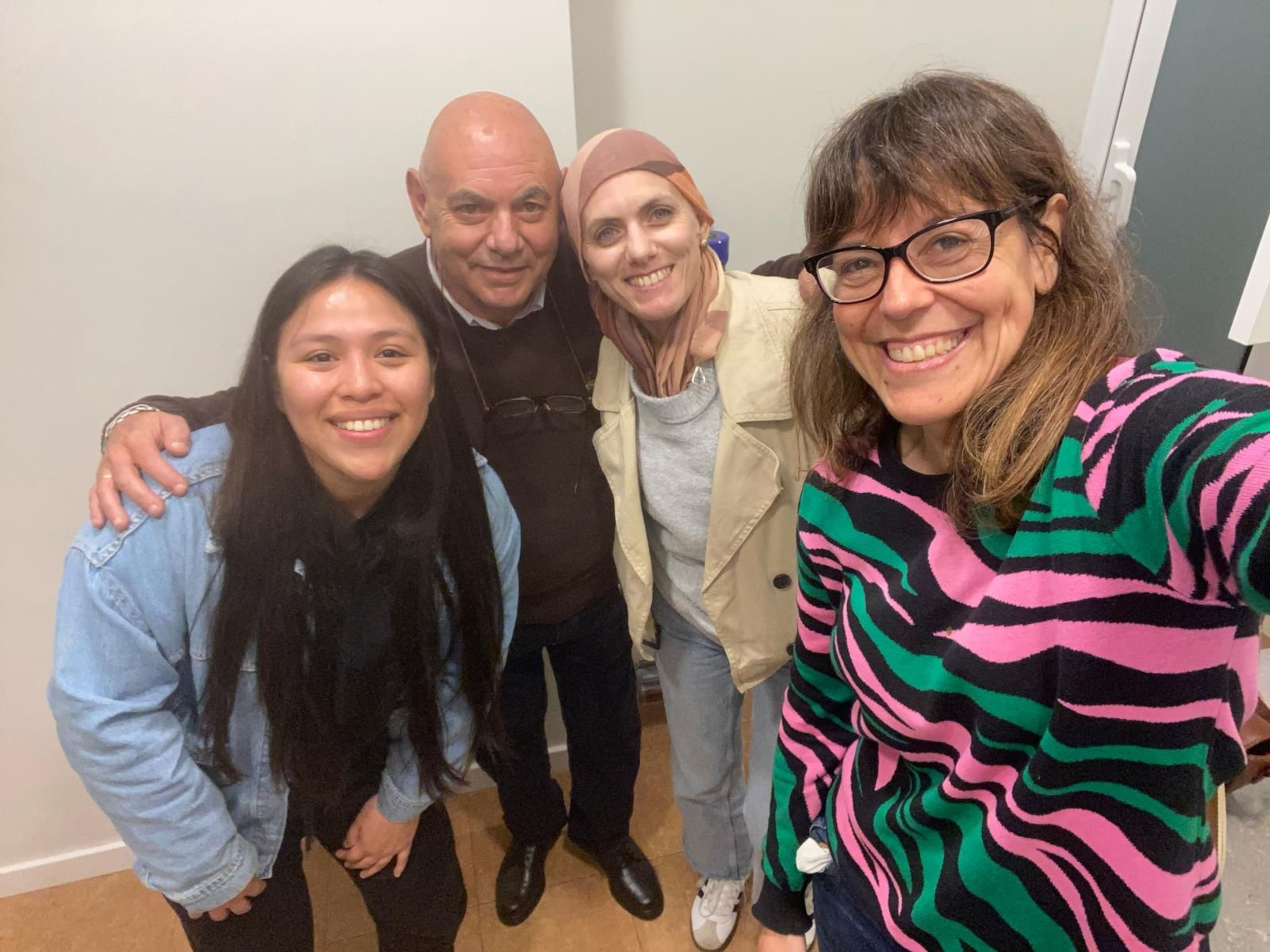 Cancer patient Beatriz Molina with her father and Marta Fernández and Jasmin Apéstegui from the Josep Carreras Foundation in Barcelona