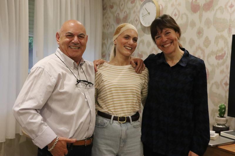 Cancer patient Beatriz Molina with her father and Marta Fernández from the Josep Carreras foundation in Barcelona