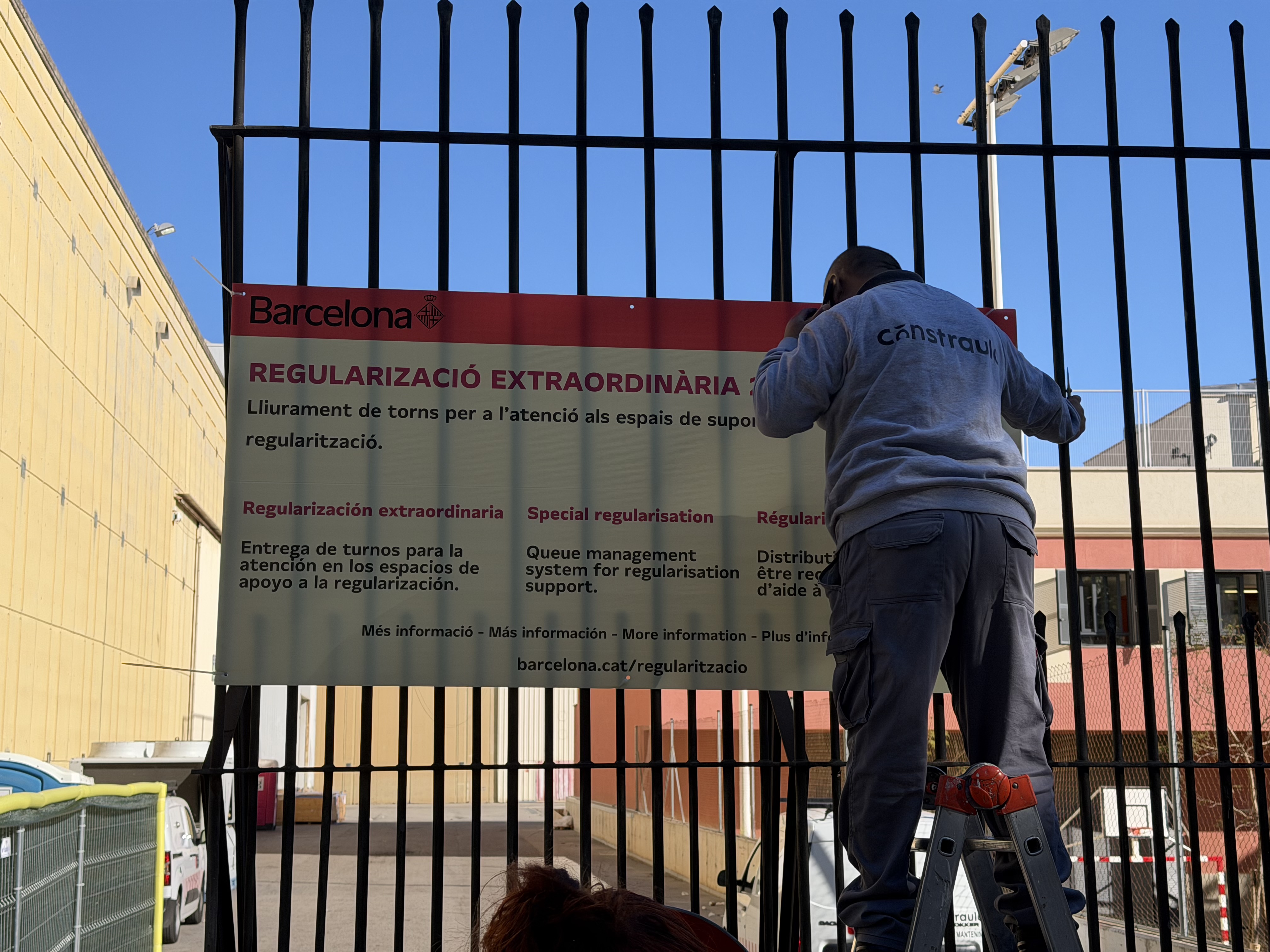 Staff at Fira de Barcelona's Montjuïc site prepare for the migrant regularisation process