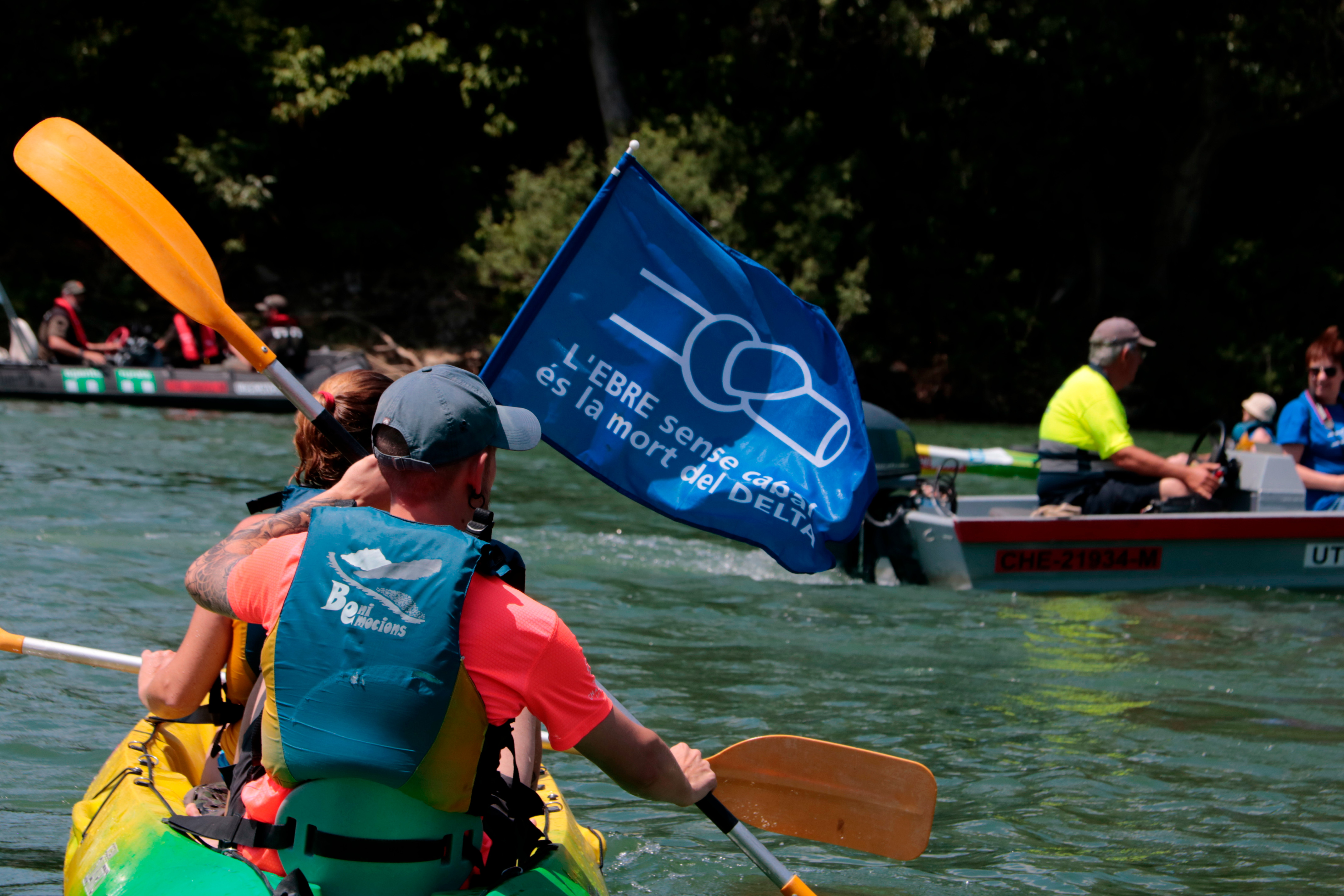 A poster reads 'The Ebre River without water is the death of the Delta area," during a protest on June 8, 2025