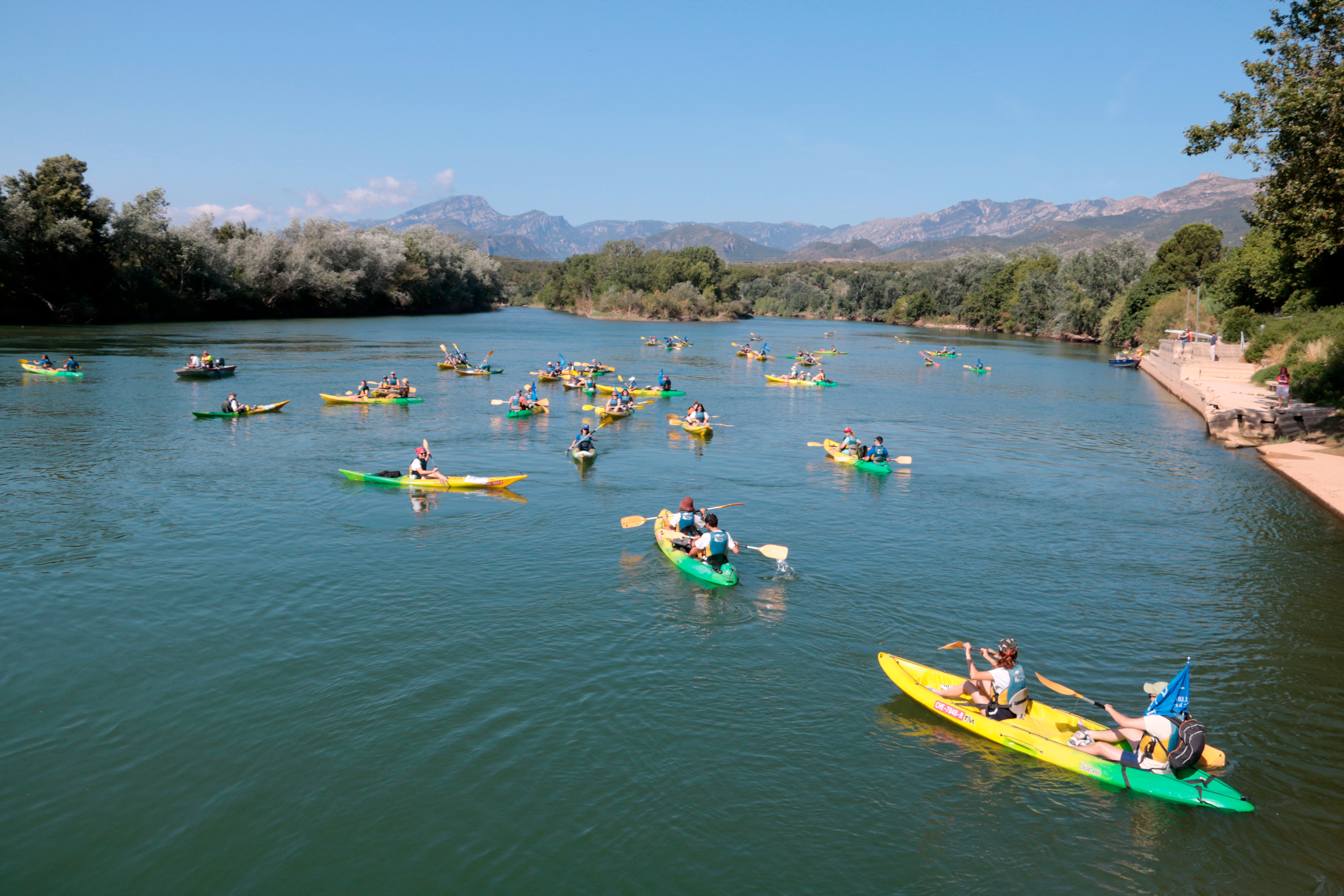Dozens of people kayak down the Ebre river to demonstrate against the water transfer on June 8, 2025