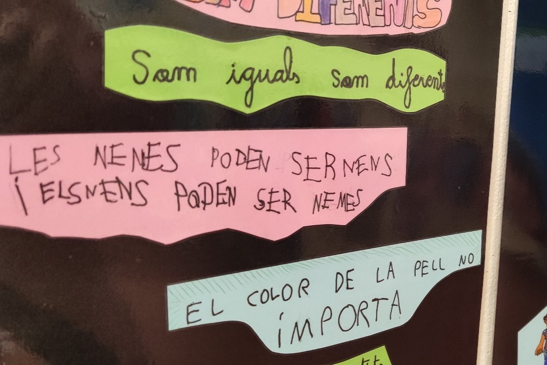 Some artwork saying 'girls can be boys, and boys can be girls,' in a school in Barcelona