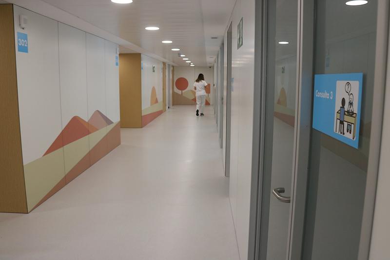 A nurse walking down the hall of Vall d'Hebron's new in-patient mental health unit for kids and teens. 