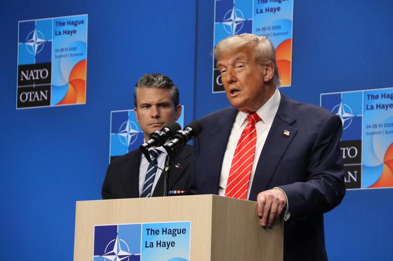 US President Donald Trump with his defense secretary Pete Hegseth at the NATO summit
