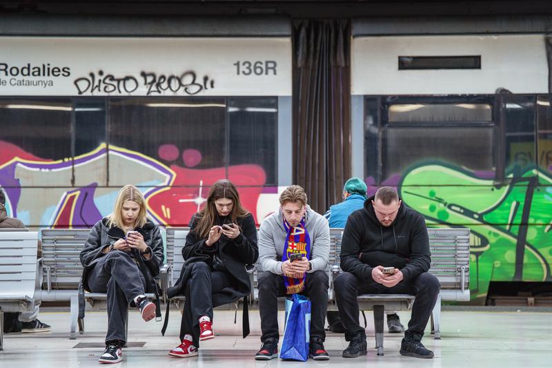Passengers waiting for a train on the first day of the three-day rail strike