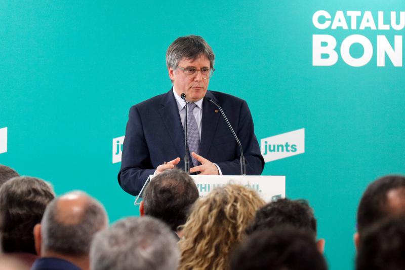 Former Catalan president Carles Puigdemont addresses Junts party members in Perpignan