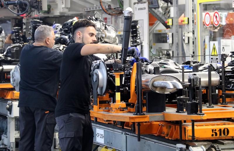 A factory line worker in the Seat factory in Martorell