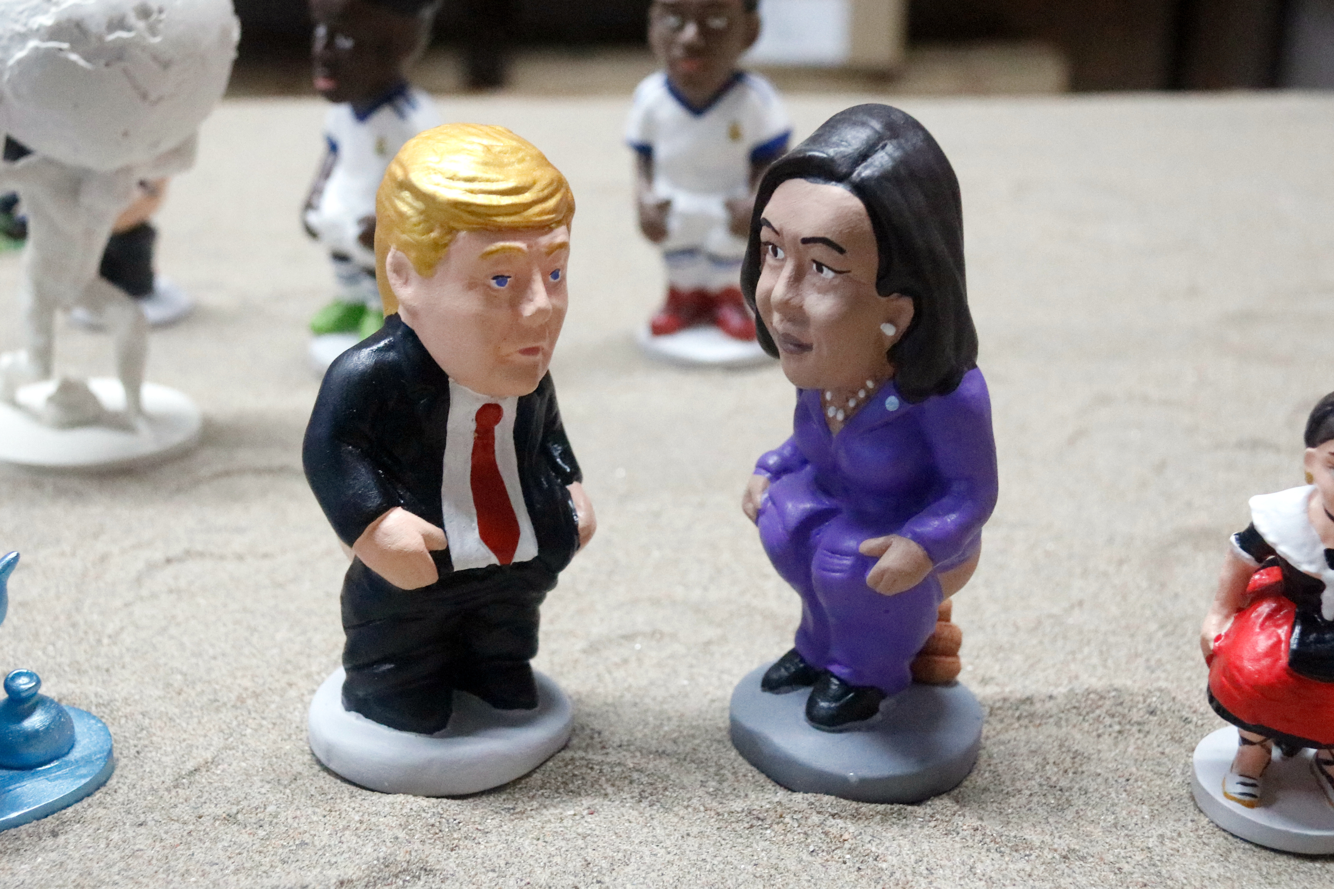 Caganers Donald Trump and Kamala Harris