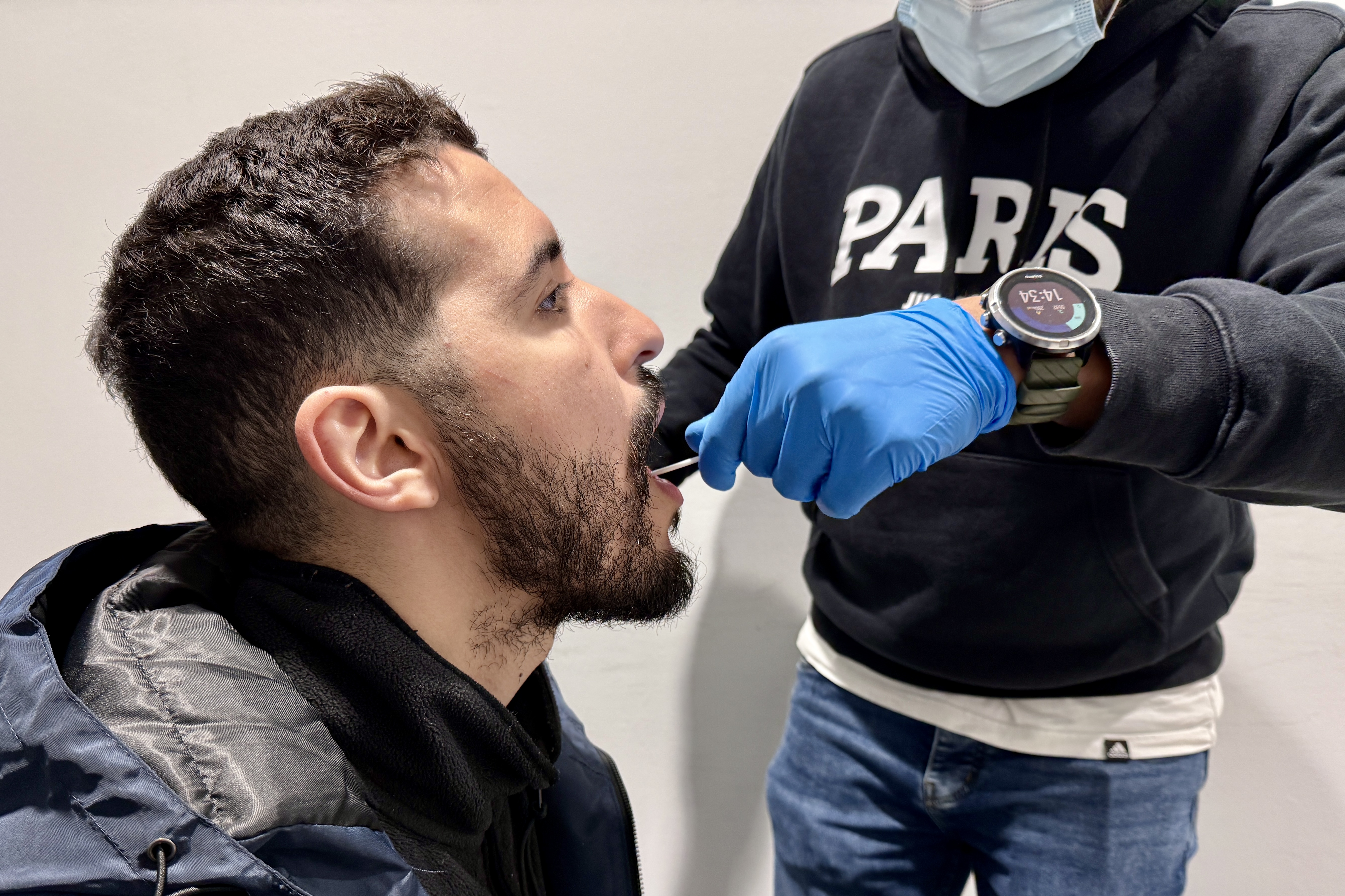 Amine M. gives his DNA sample with the authorities in Barcelona